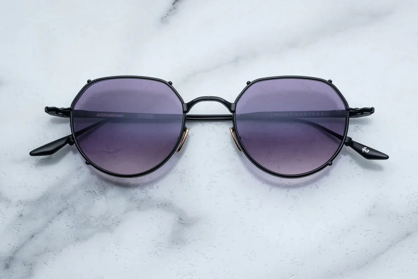 Jacques Marie Mage Hartana sunglasses in Blackberry (matte black with purple lenses).